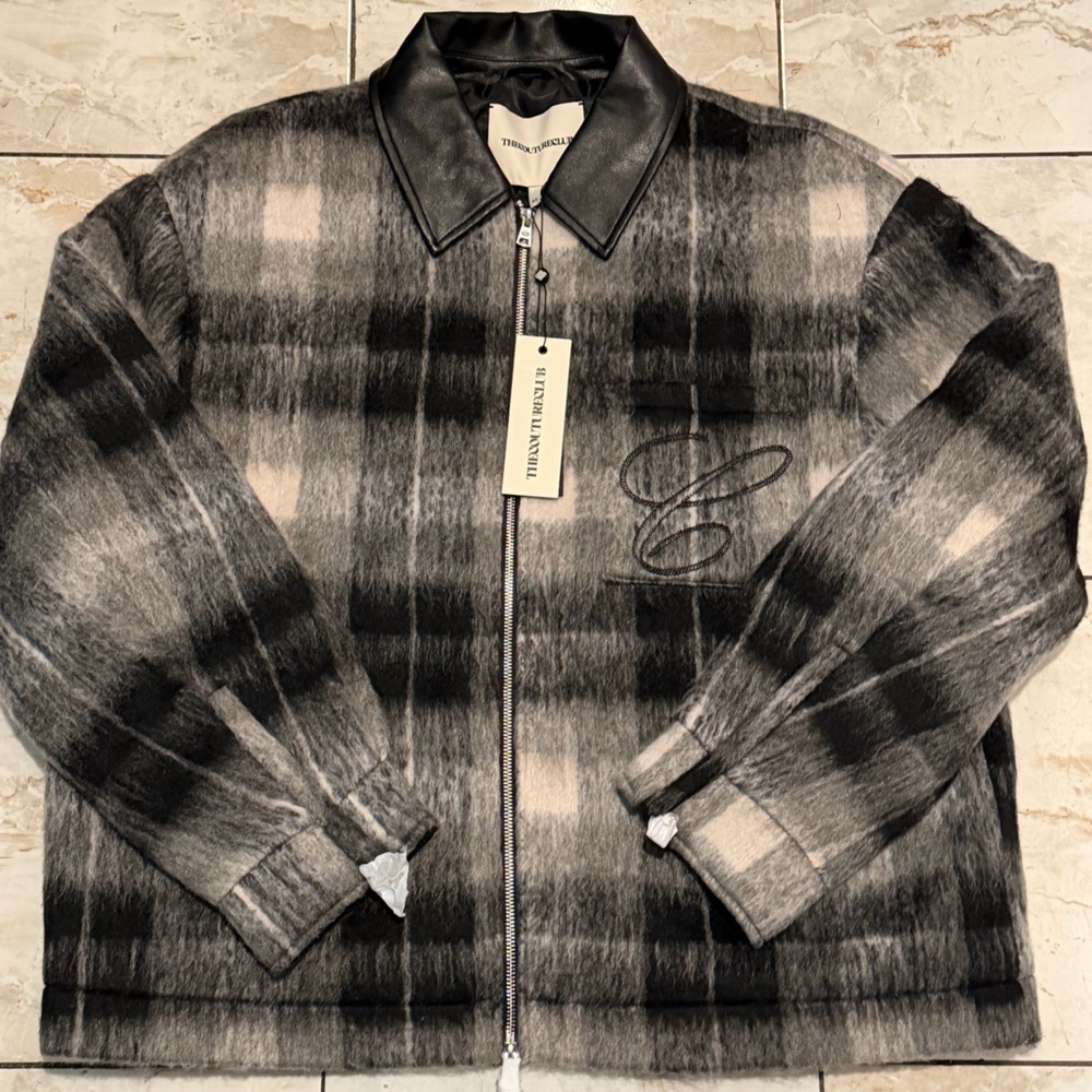 The couture club black and white checkered faux fur jacket NWT